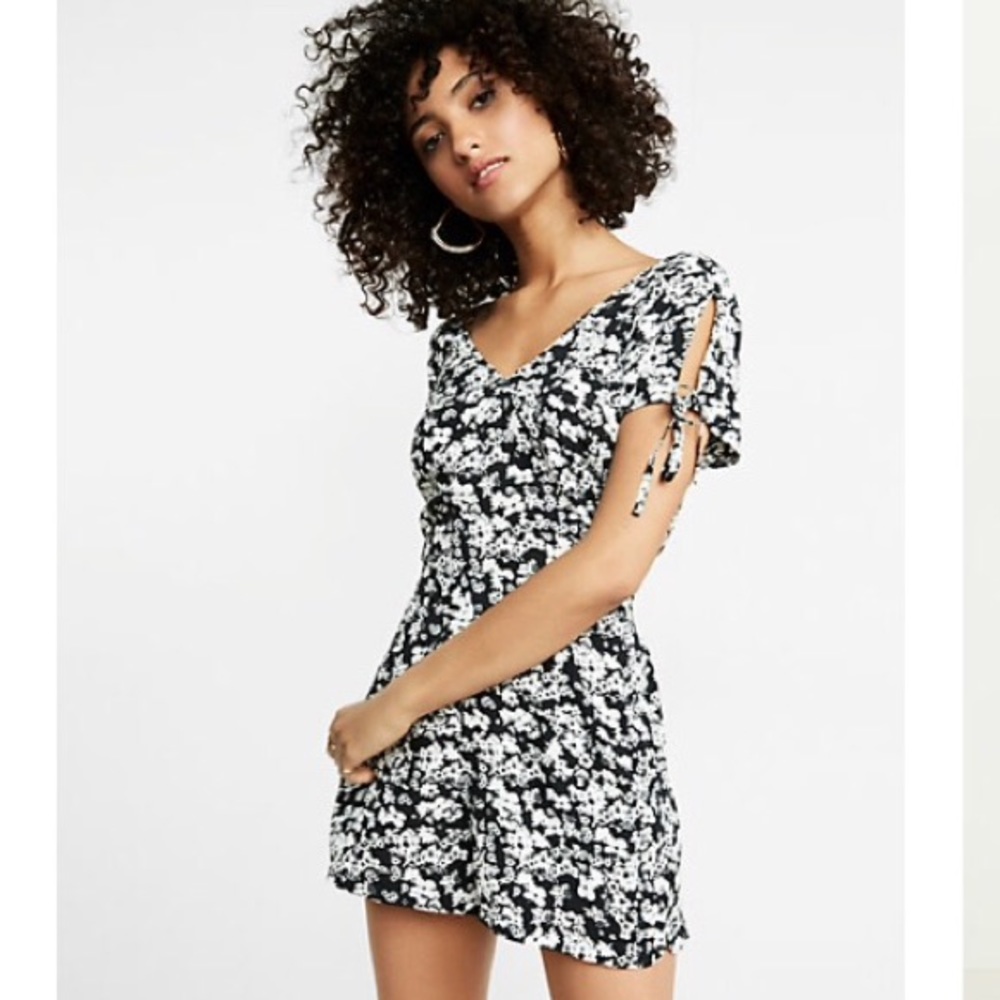 Express black and white romper. New without tags